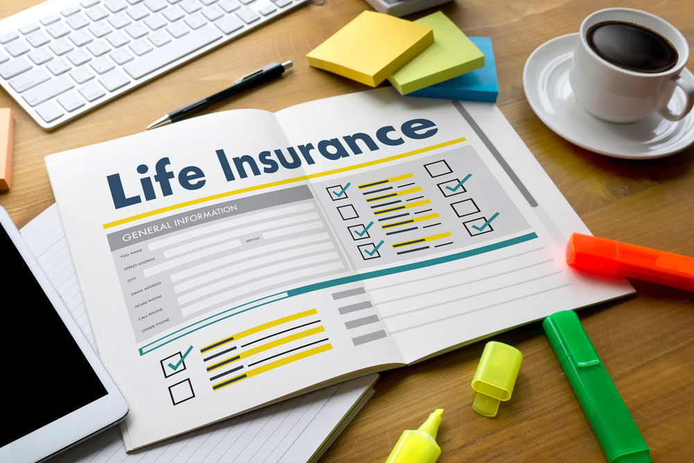 life insurance paperwork on desk