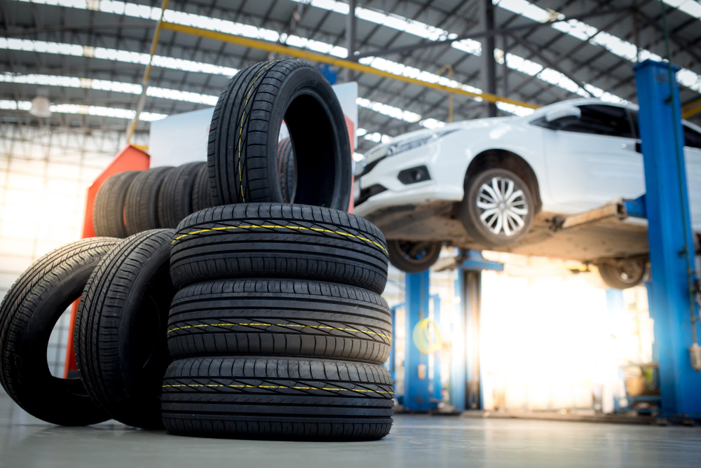 car in shop getting tire rotation