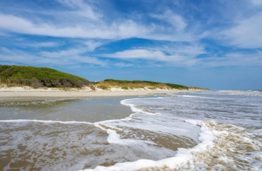 Beach and ocean One of the Golden Isles barrier islands off of Georgia - Cheap Auto Insurance in Georgia 