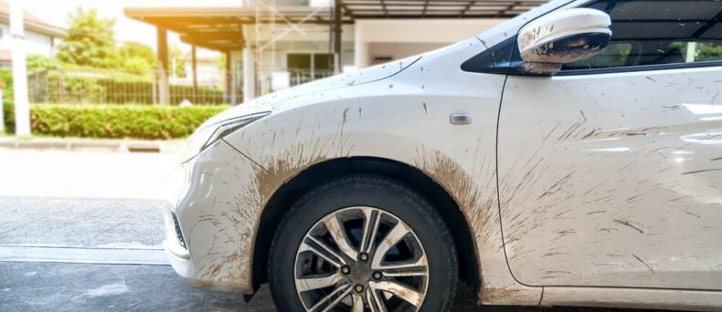 Side view of white car with dirty car mud stain - Southern Harvest Cheap homeowners in Georgia.